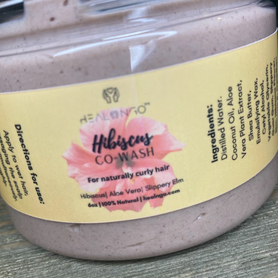 Botanical hair care co-wash for curls and coils designed to reduce dryness and frizz