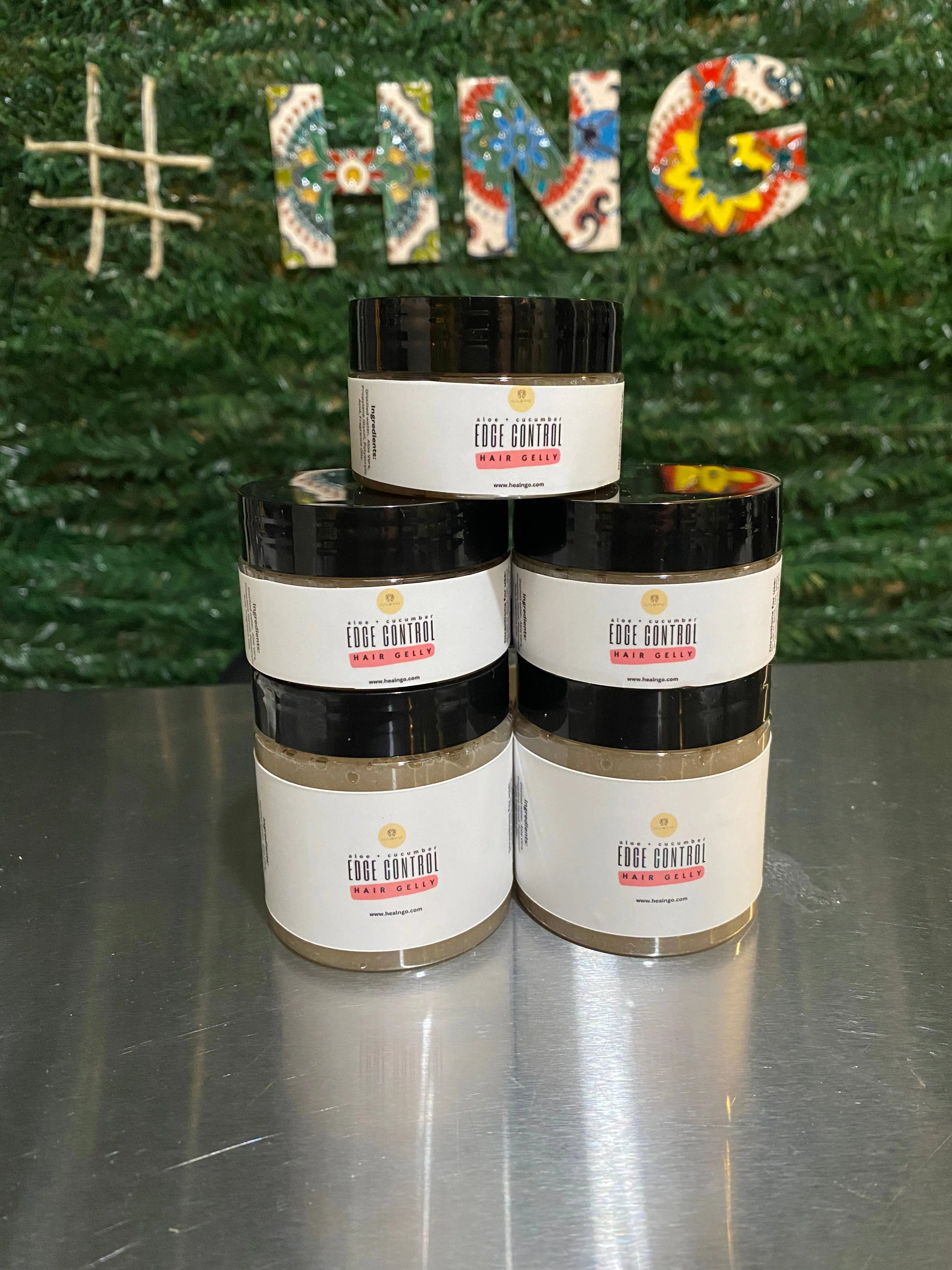 The Aloe + Cucumber Edge Control Hair Gelly will define and keep the curls bouncy and not stiff as other gels do. Made with all natural products.