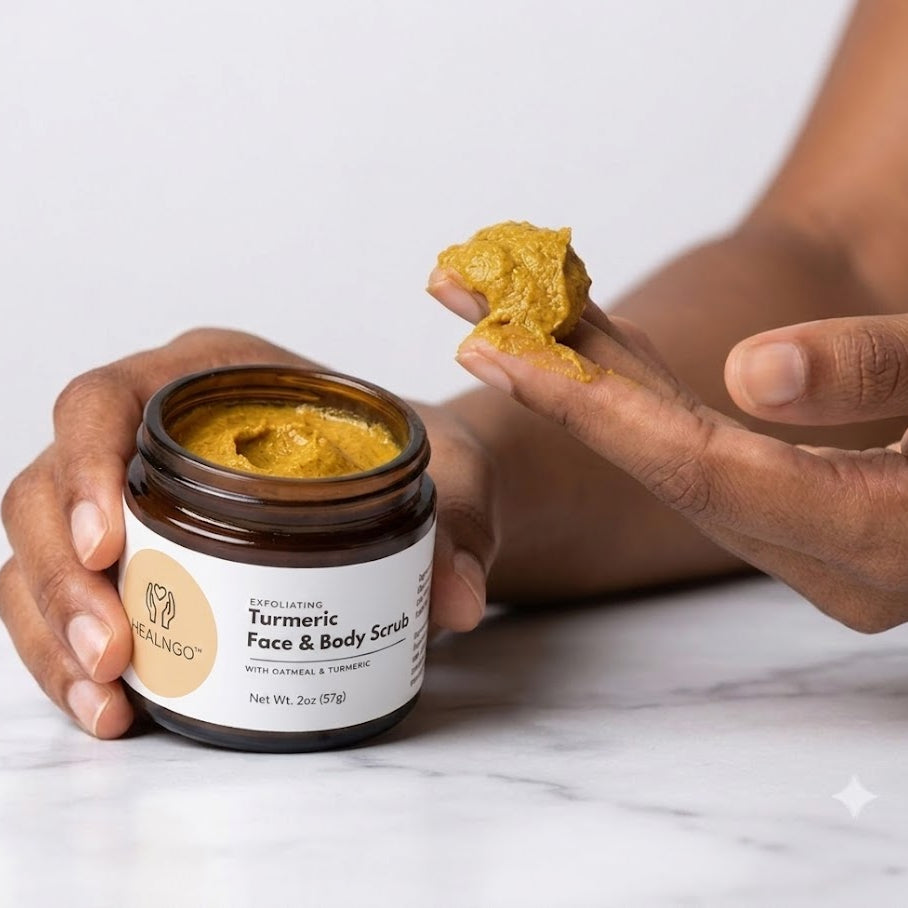 Turmeric Face and Body Scrub with oatmeal, kaolin clay, baking soda, and glycerin gently exfoliating skin to remove dead skin cells, unclog pores, brighten complexion, and smooth rough texture for a natural radiant glow.
