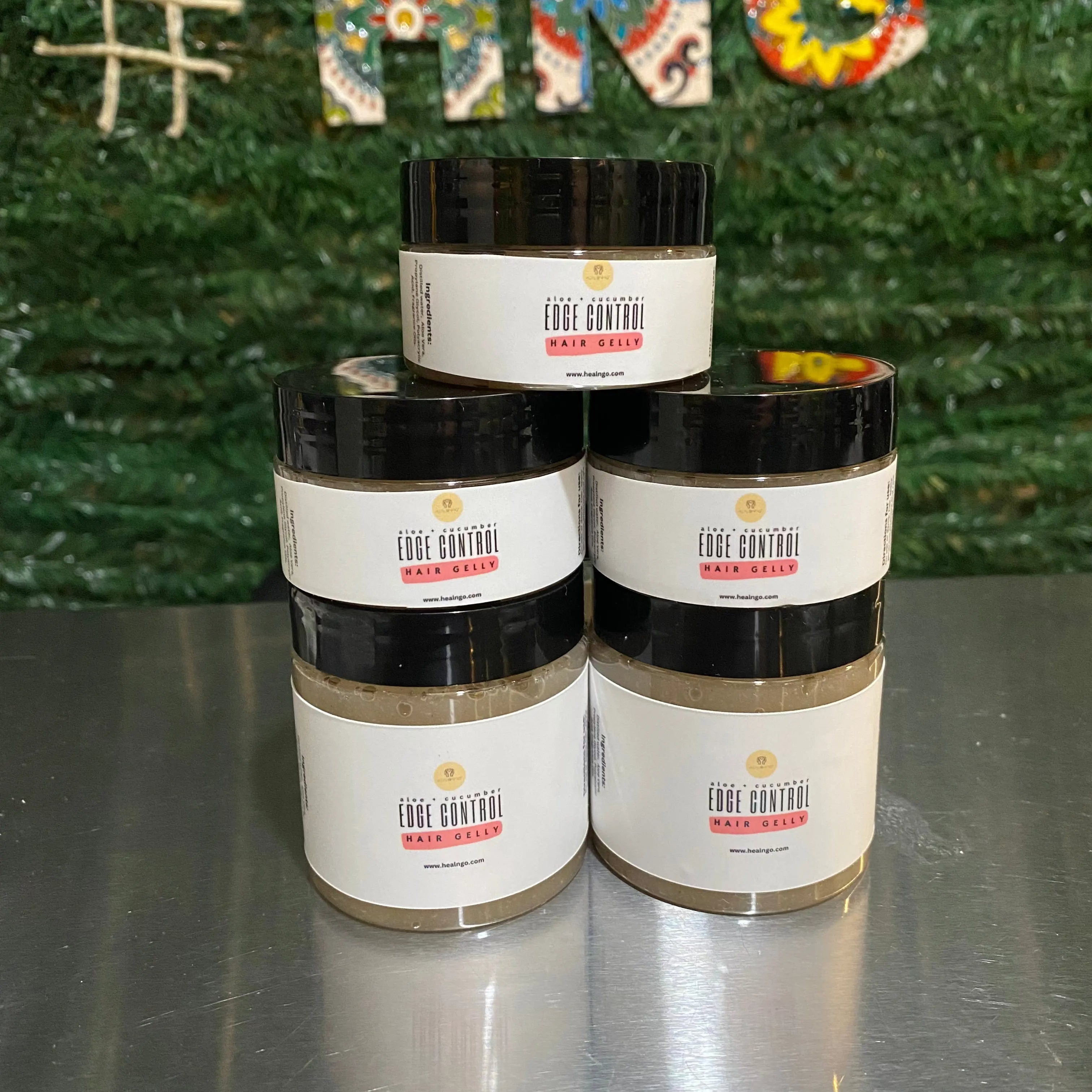 Aloe + cucumber melon hair gelly for natural hair styling and edge control with smooth hold