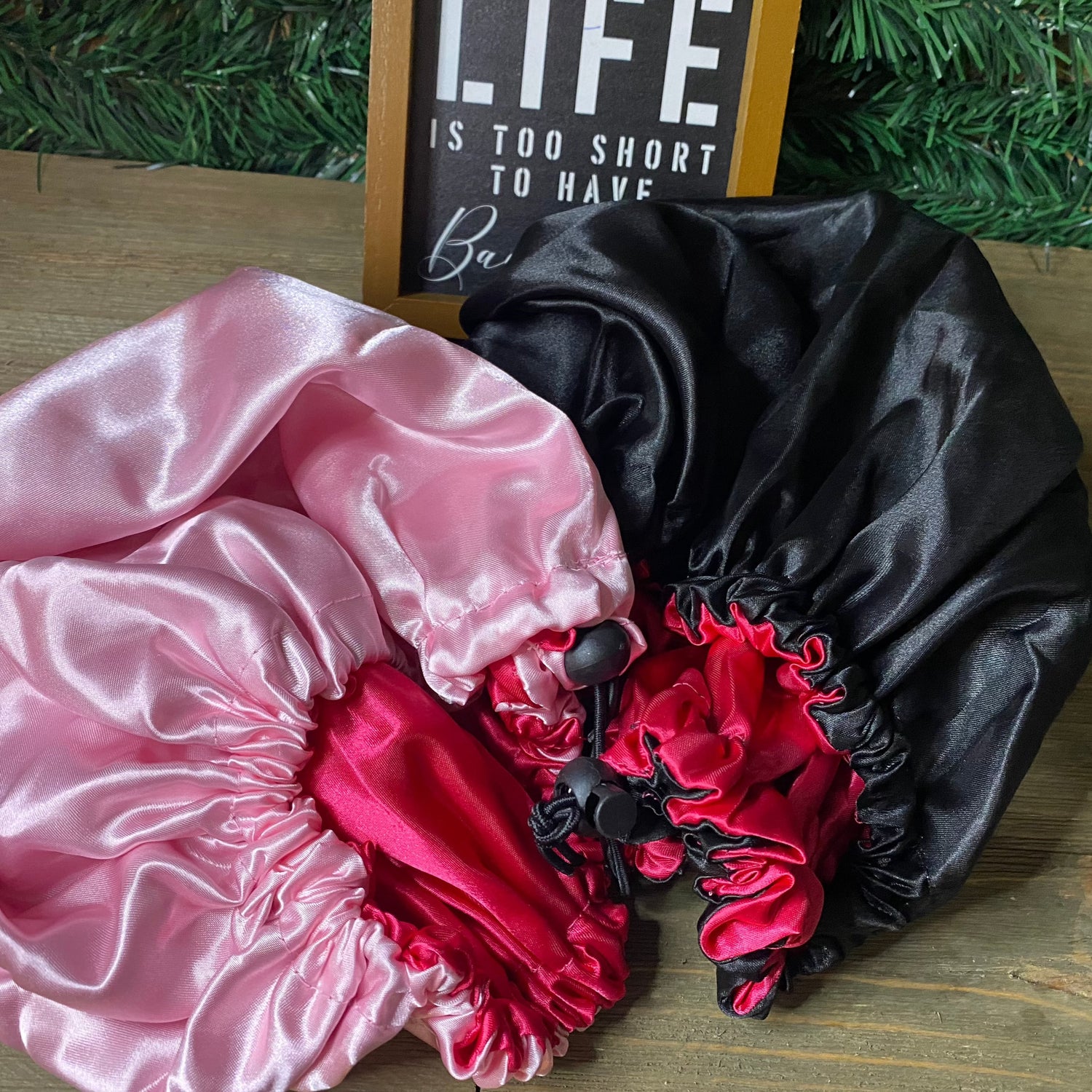   Pink and Black satin hair bonnet for natural curls and coily textures