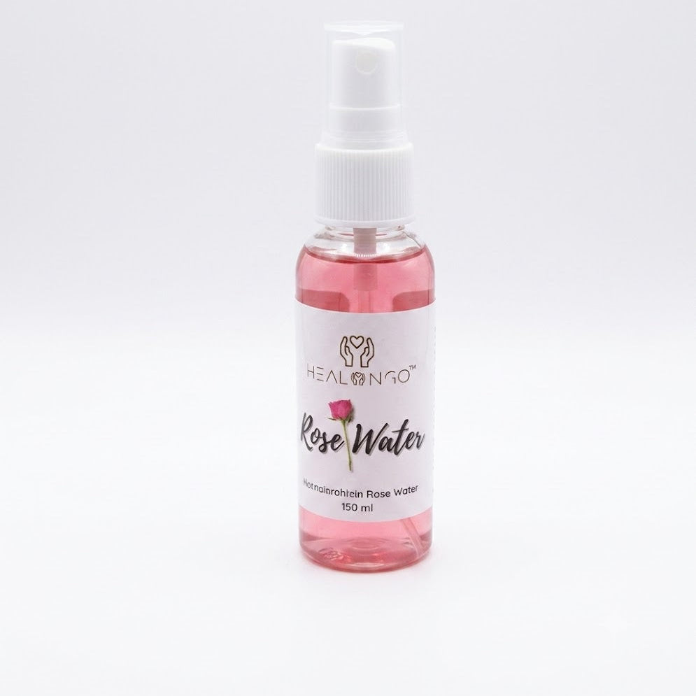 Woman using Rose Water Nourish Skin &amp; Refresh Hair mist, hydrating facial toner spray for glowing skin and lightweight hair refresher for curls, braids, and natural textured hair, soothing daily moisture boost for skin and scalp.