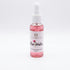 Woman using Rose Water Nourish Skin & Refresh Hair mist, hydrating facial toner spray for glowing skin and lightweight hair refresher for curls, braids, and natural textured hair, soothing daily moisture boost for skin and scalp.