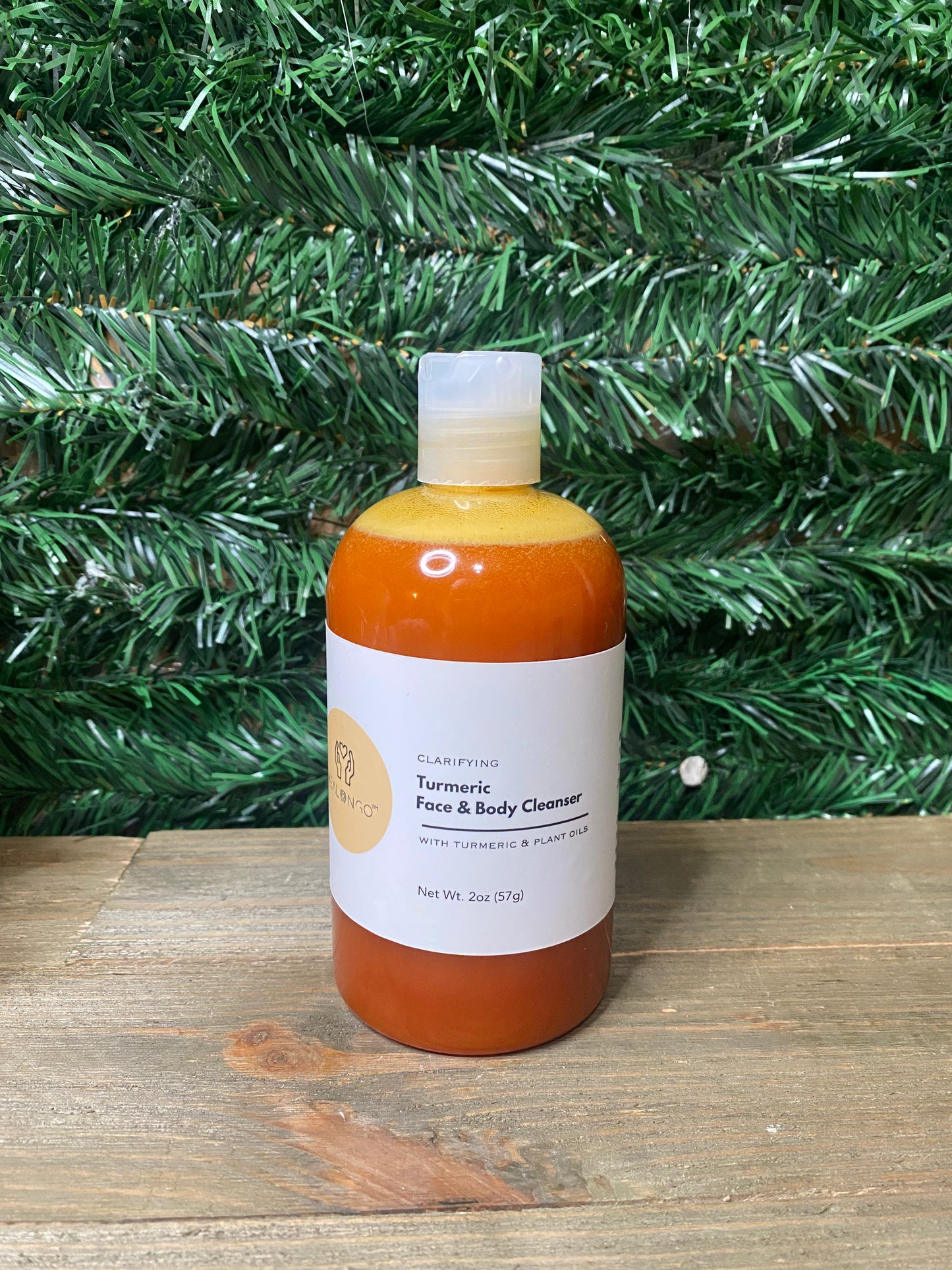 Natural turmeric skin cleanser for face and body with brightening benefits
