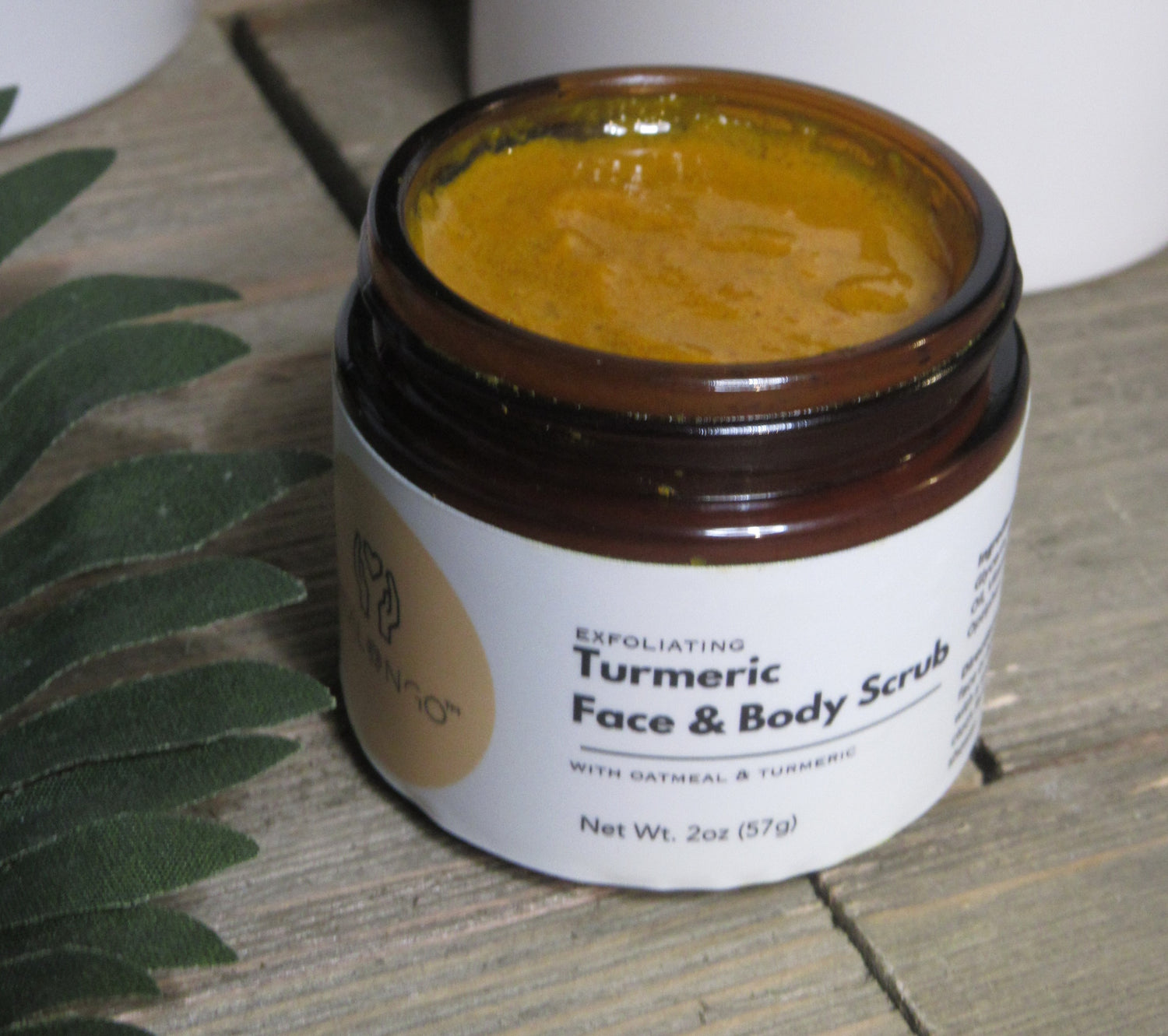Turmeric face and body scrub exfoliant for glowing skin, natural turmeric scrub on body and face
