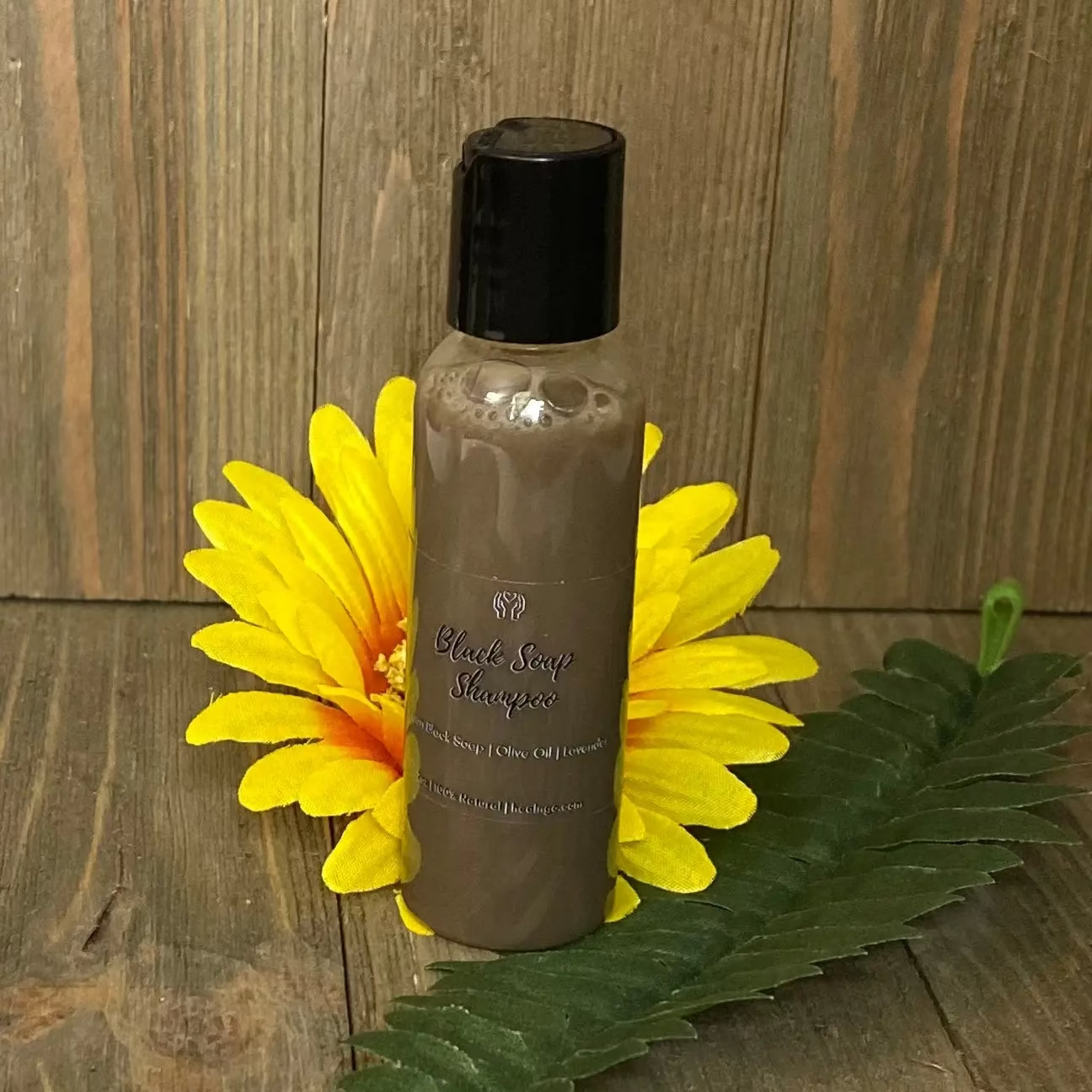 Natural African Black Soap Shampoo infused with marshmallow root, flaxseed, and olive oil for healthy hair