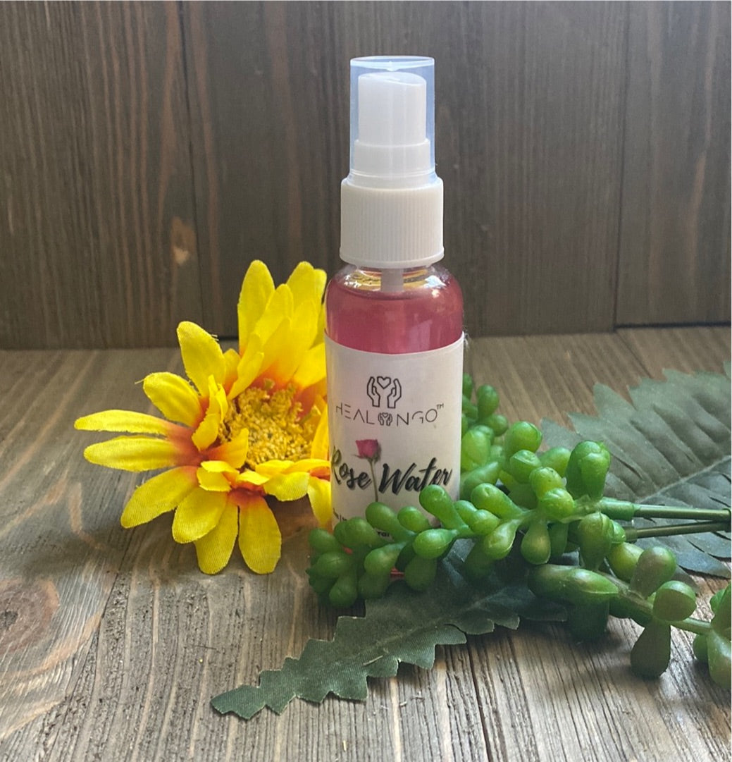 Organic face rose water with vitamins A, B3, C, E for healthy skin and hair