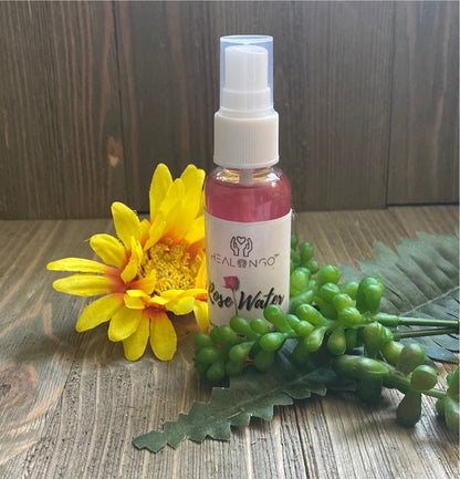 Organic face rose water with vitamins A, B3, C, E for healthy skin and hair