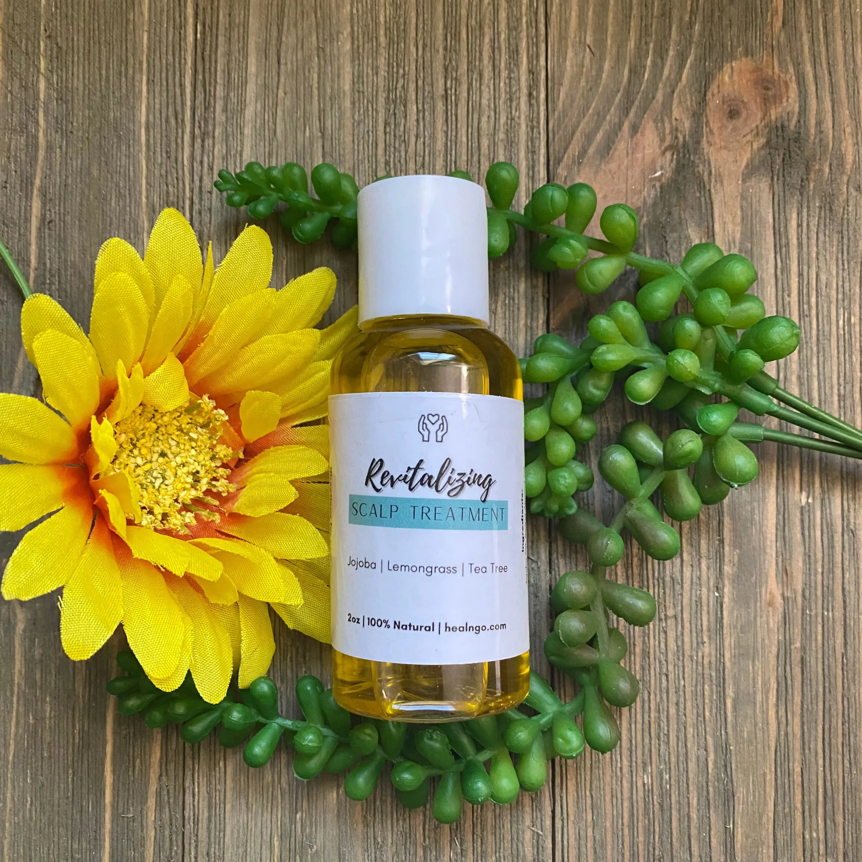 Plant-based revitalizing scalp oil for strengthening roots and improving scalp health